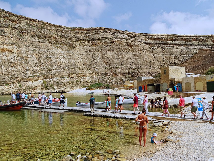 Tourists in Inland Sea, Dwejra, Gozo Malta